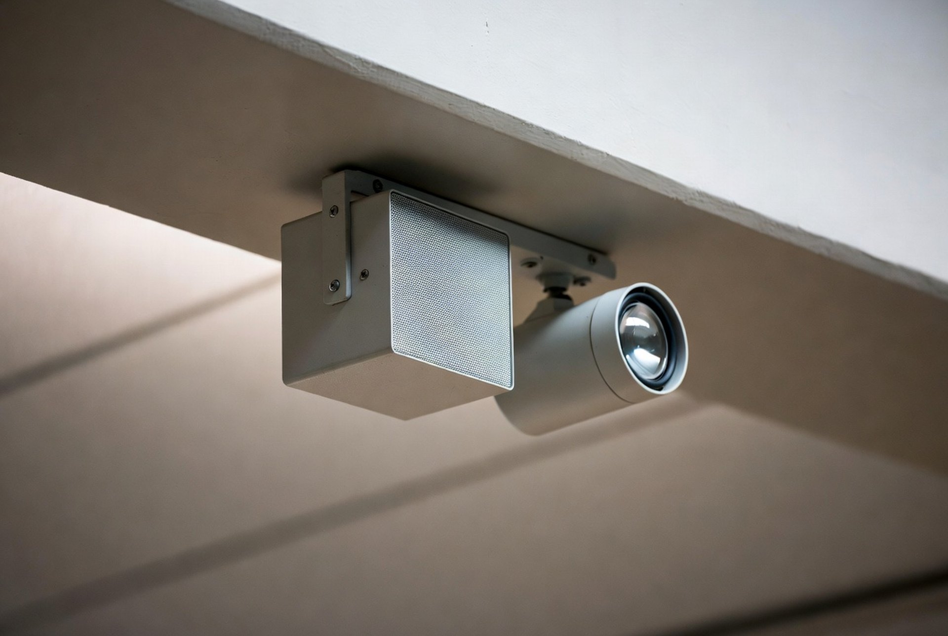 A ceiling-mounted speaker and notification device in a corridor